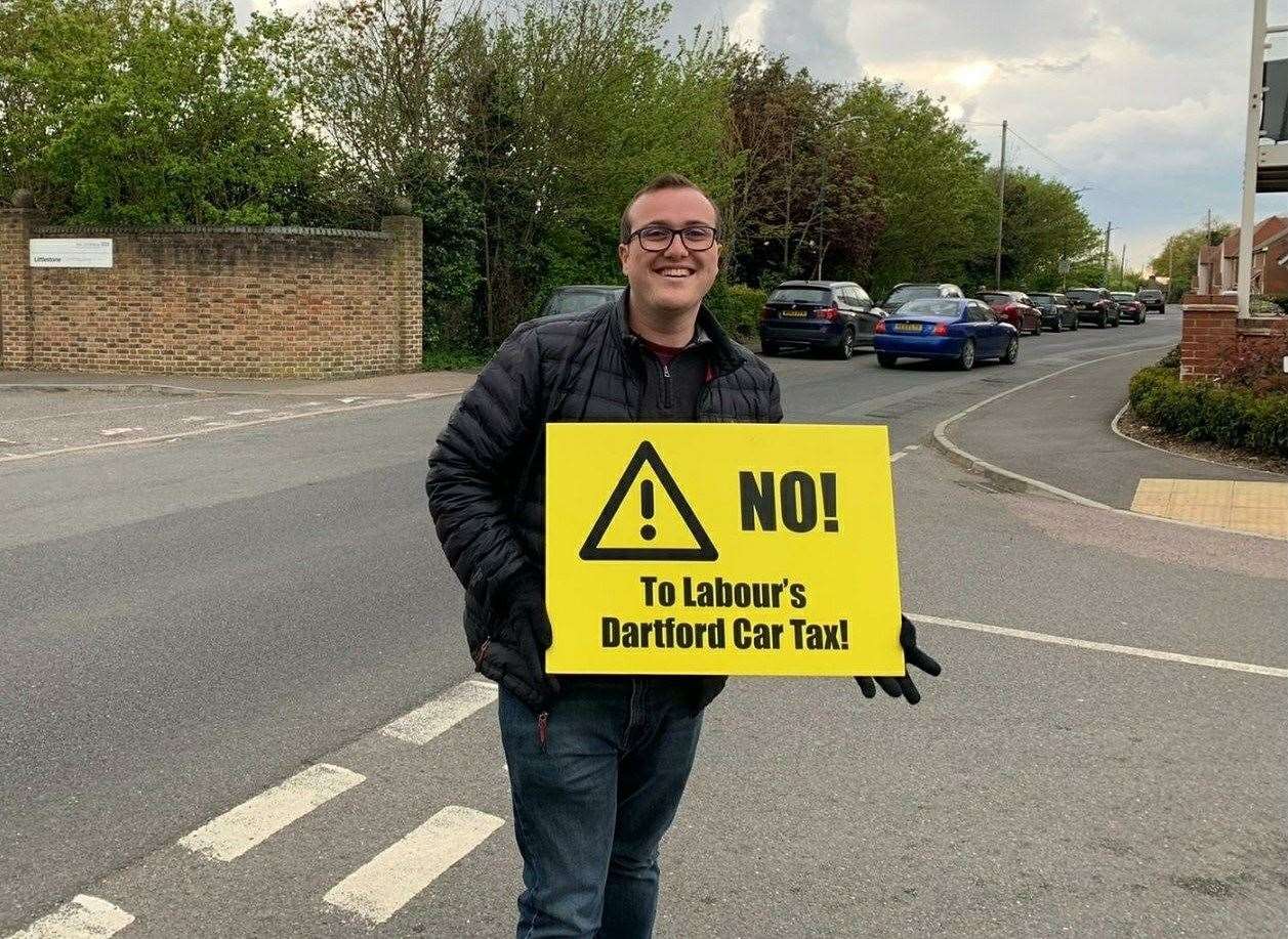 George Holt, with a sign opposing Labour's Dartford Car Tax