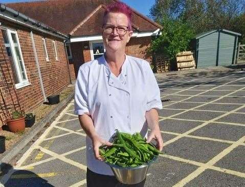 Head chef Sarah Pamour, holding some of the produce from the new community garden in Hawkhurst. Picture: Sarah Pambour