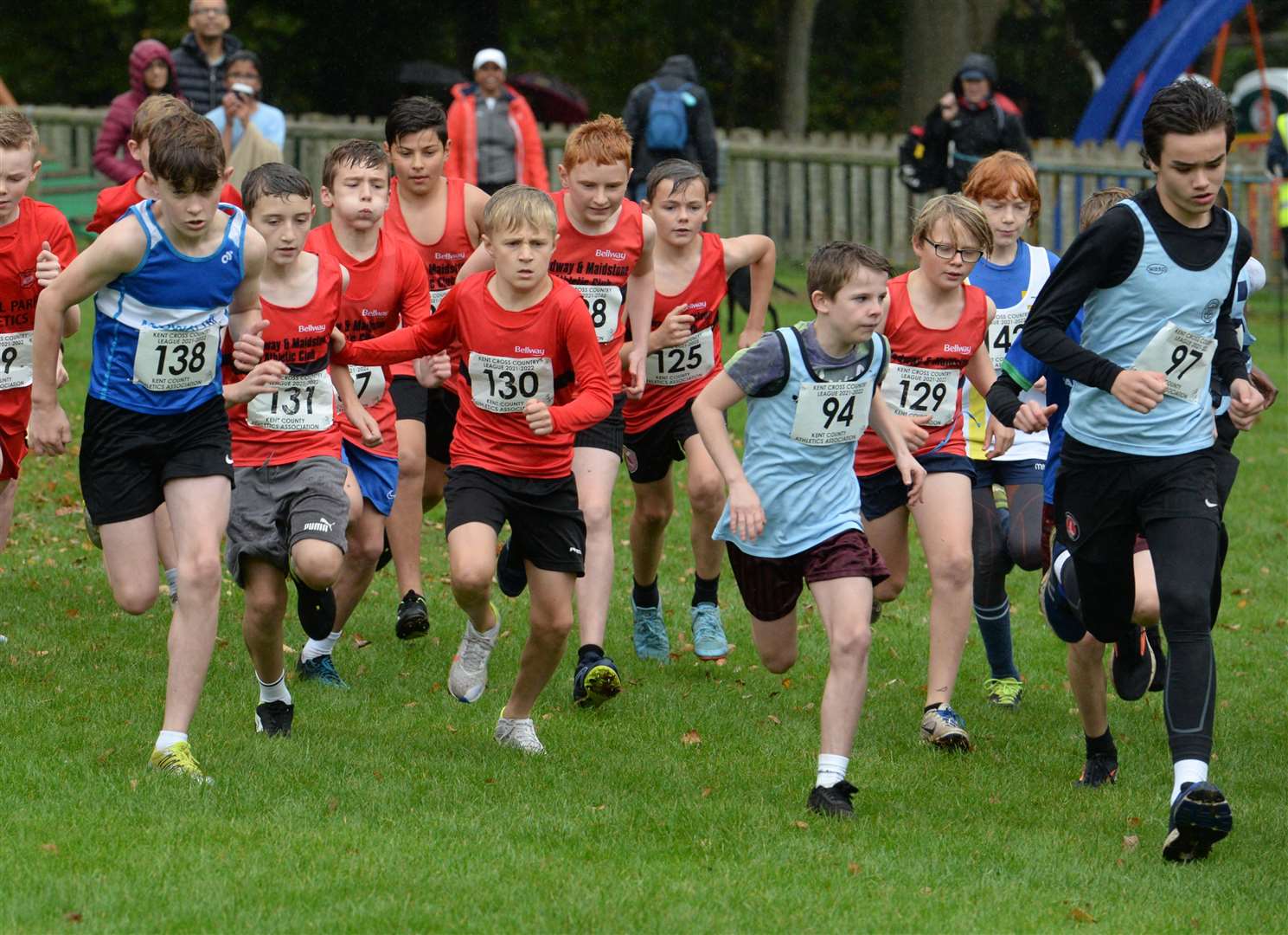 No.138 Oliver Darcy of Medway Tri up against No.130 Freddie Gibson of Medway & Maidstone and No.94 Oliver Hill for Cambridge Harriers in the under-15 boys' race. Picture: Chris Davey (52347960)