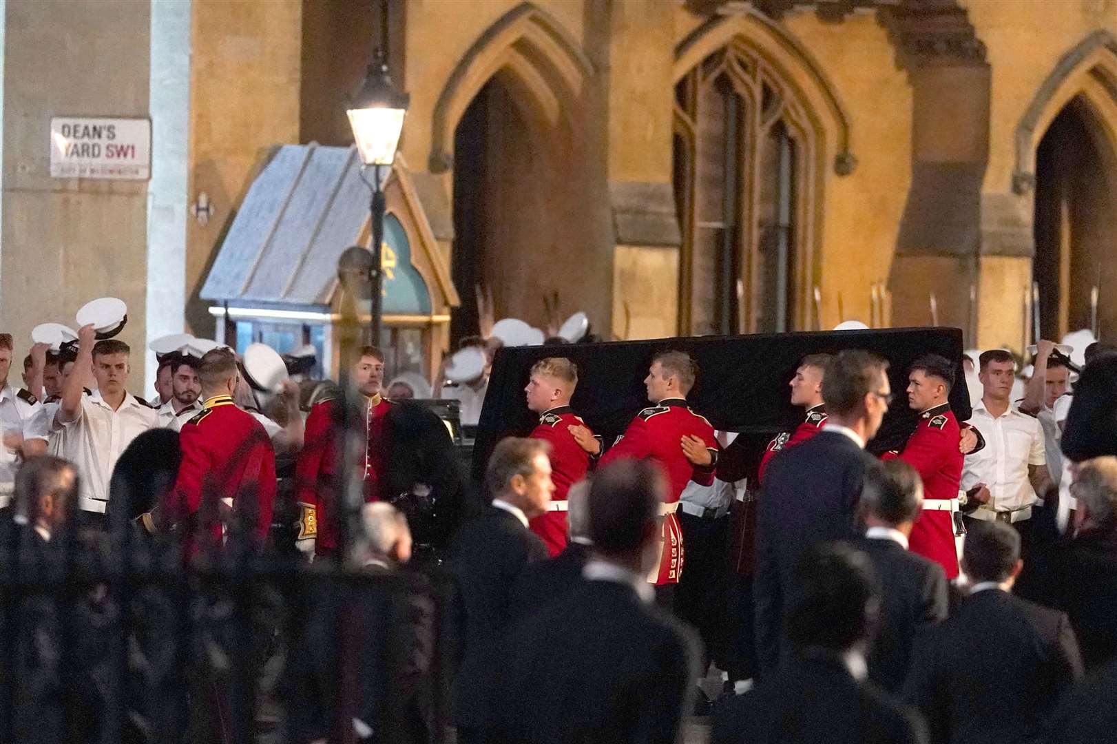 A coffin is carried in to Westminster Abbey (Gareth Fuller/PA)
