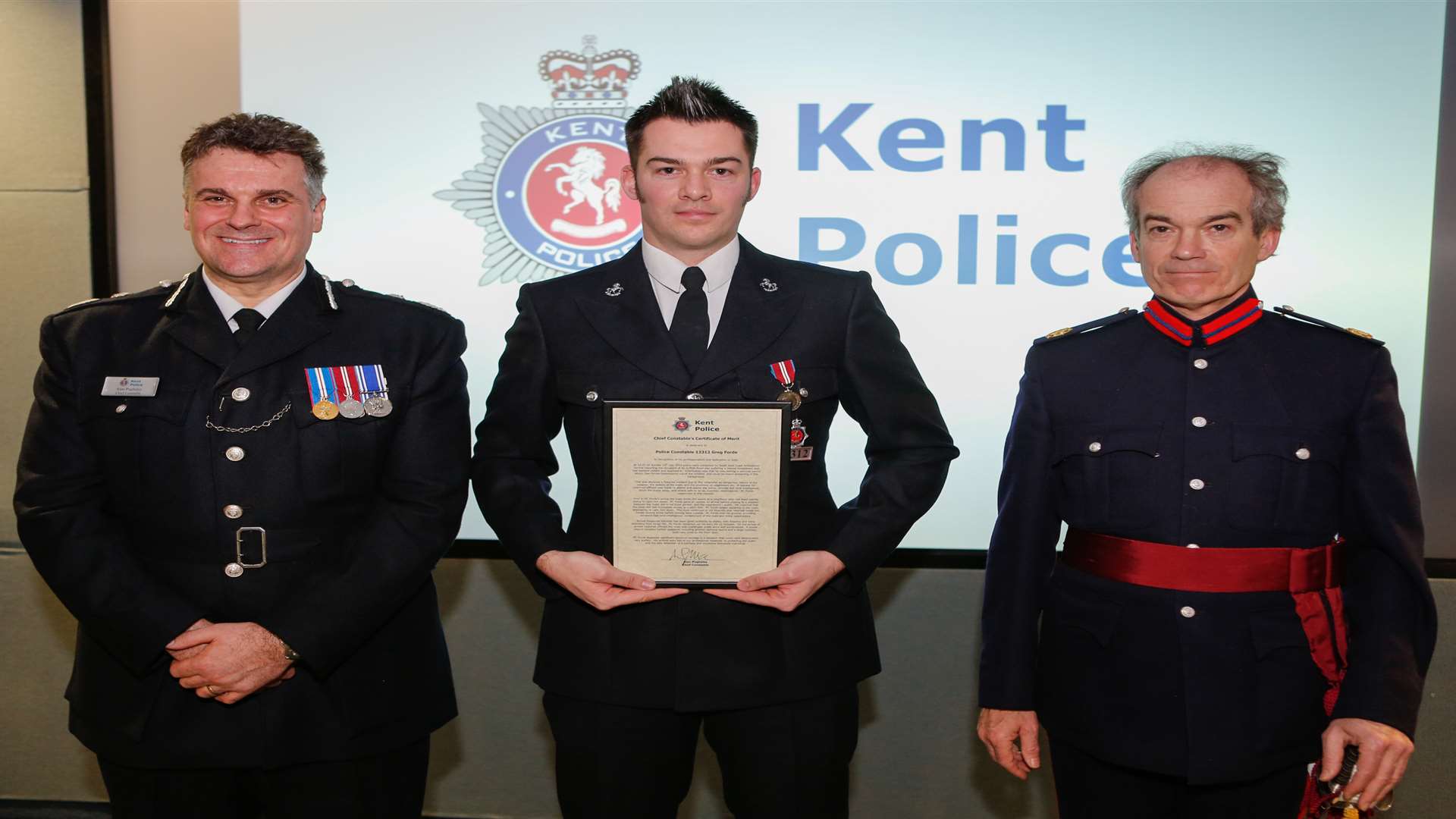 Chief Constable Alan Pughsley, PC Greg Forde and Vice Lord Lieutenant of Kent Richard Oldfield