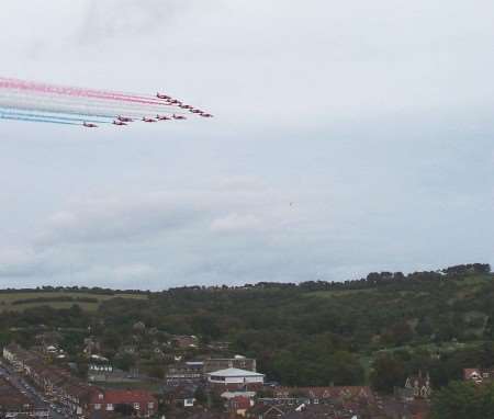 The Red Arrows fly over St Edmund's School, where one of the pilots, Jez Griggs, was educated.