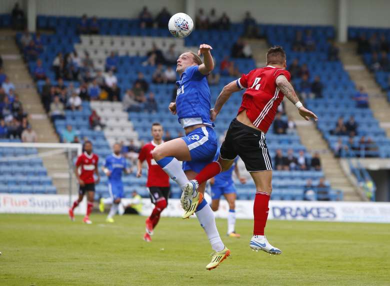Tom Eaves goes for the ball at Priestfield Picture: Andy Jones