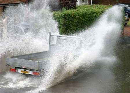 A lorry battles its way through the water in Beacon Drive, Bean. Picture sent in by resident Tom Partridge