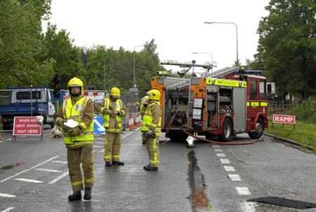 Firefighters at the scene of the gas leak. Picture: ANDY PAYTON