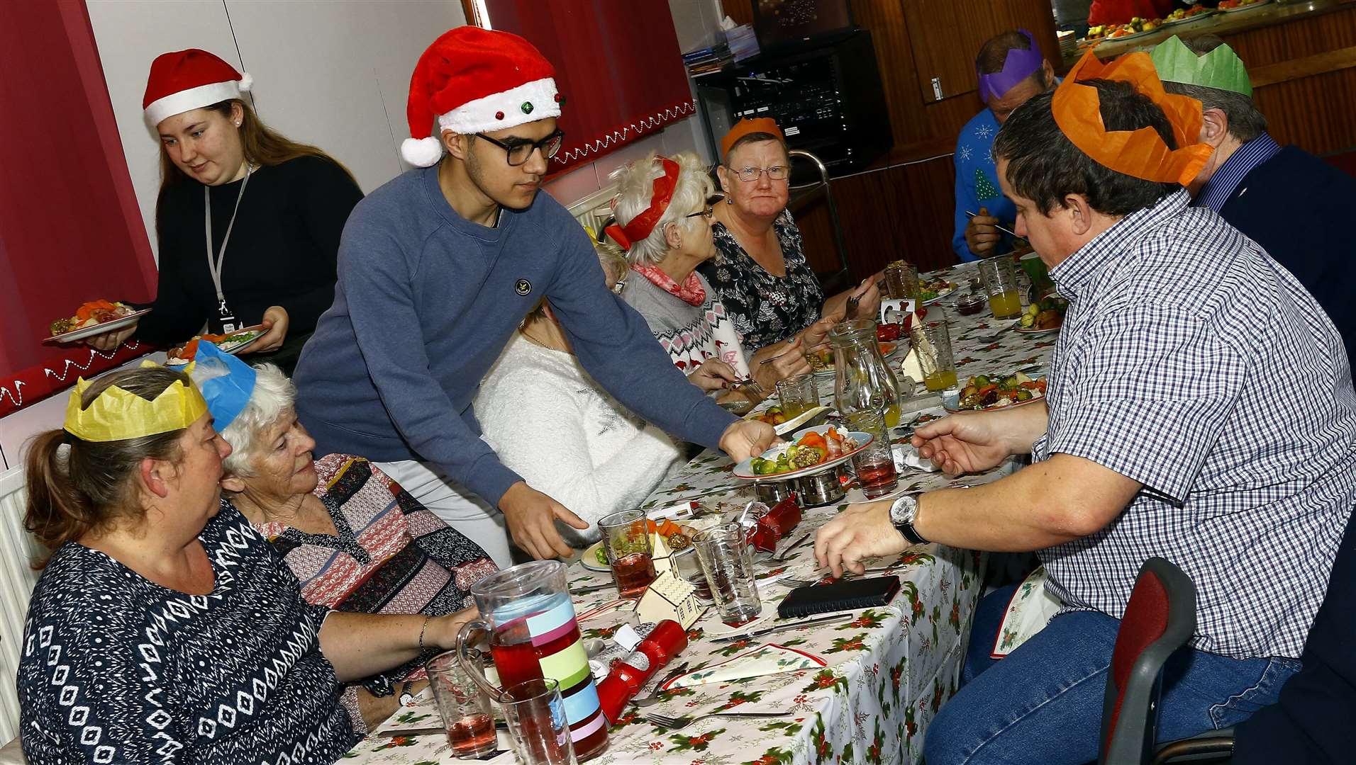 Oasis Academy pupils helping out at a Sheerness Christmas lunch for the lonely earlier this month
