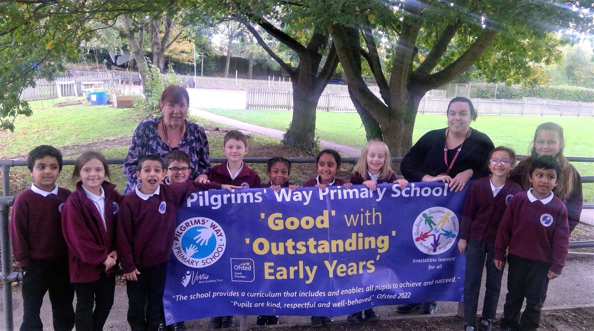 Head teacher Anne-Marie Middleton and deputy head Emma Campbell with pupils celebrating the Ofsted rating. Picture: Veritas Multi Academy Trust