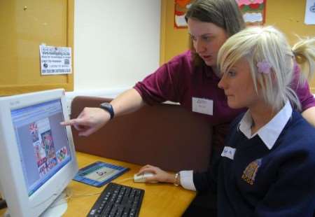 Helen Curtis, left, who is doing research in Beijing, with Emma Harvey, 15, from Barton Court Grammar School, during an imagining Olympics student workshop at Christ Church