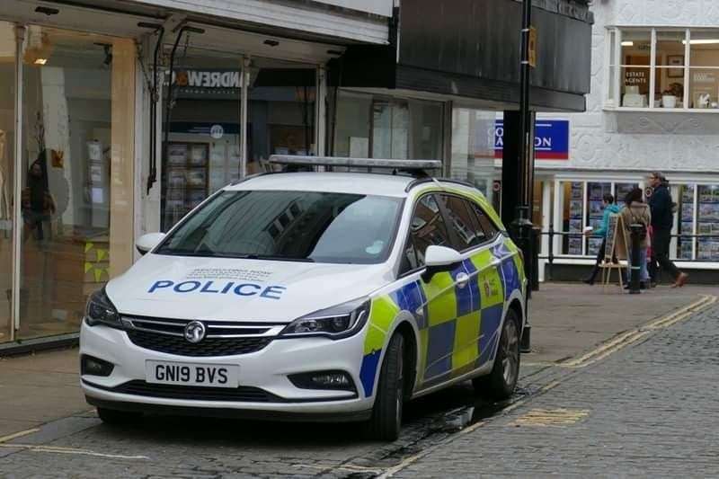 Police cars were stationed in Ashford's North Street as reports came in of an armed gang in the town on Tuesday. Picture: Andy Clark