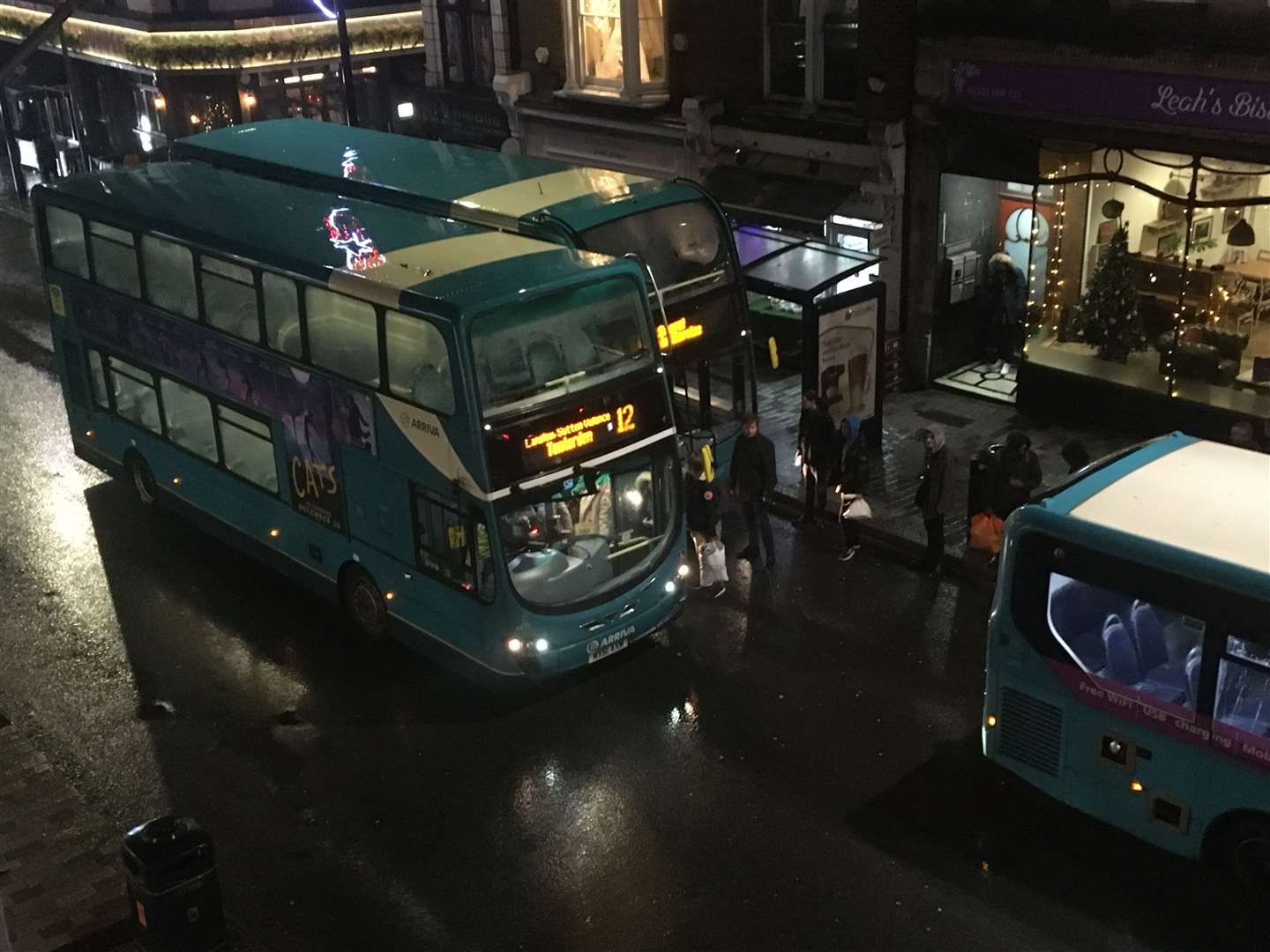 The number12 bus pulls into Maidstone High Street
