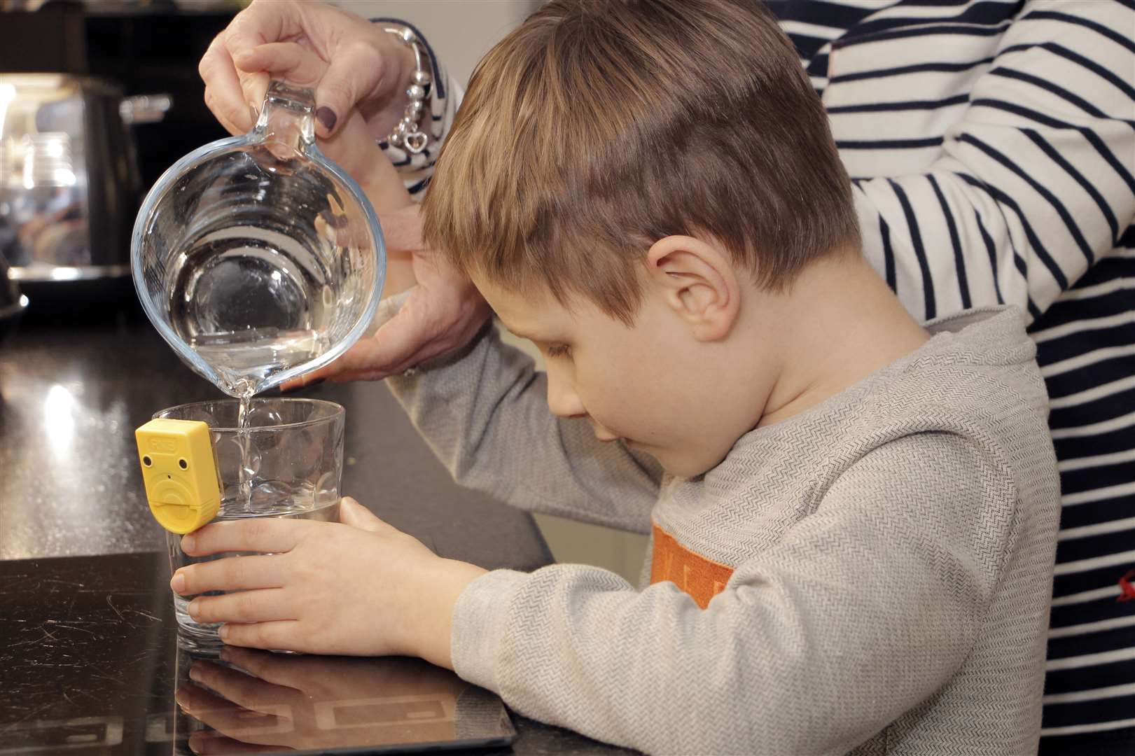 Theo receives a helpful hand from mum Jo