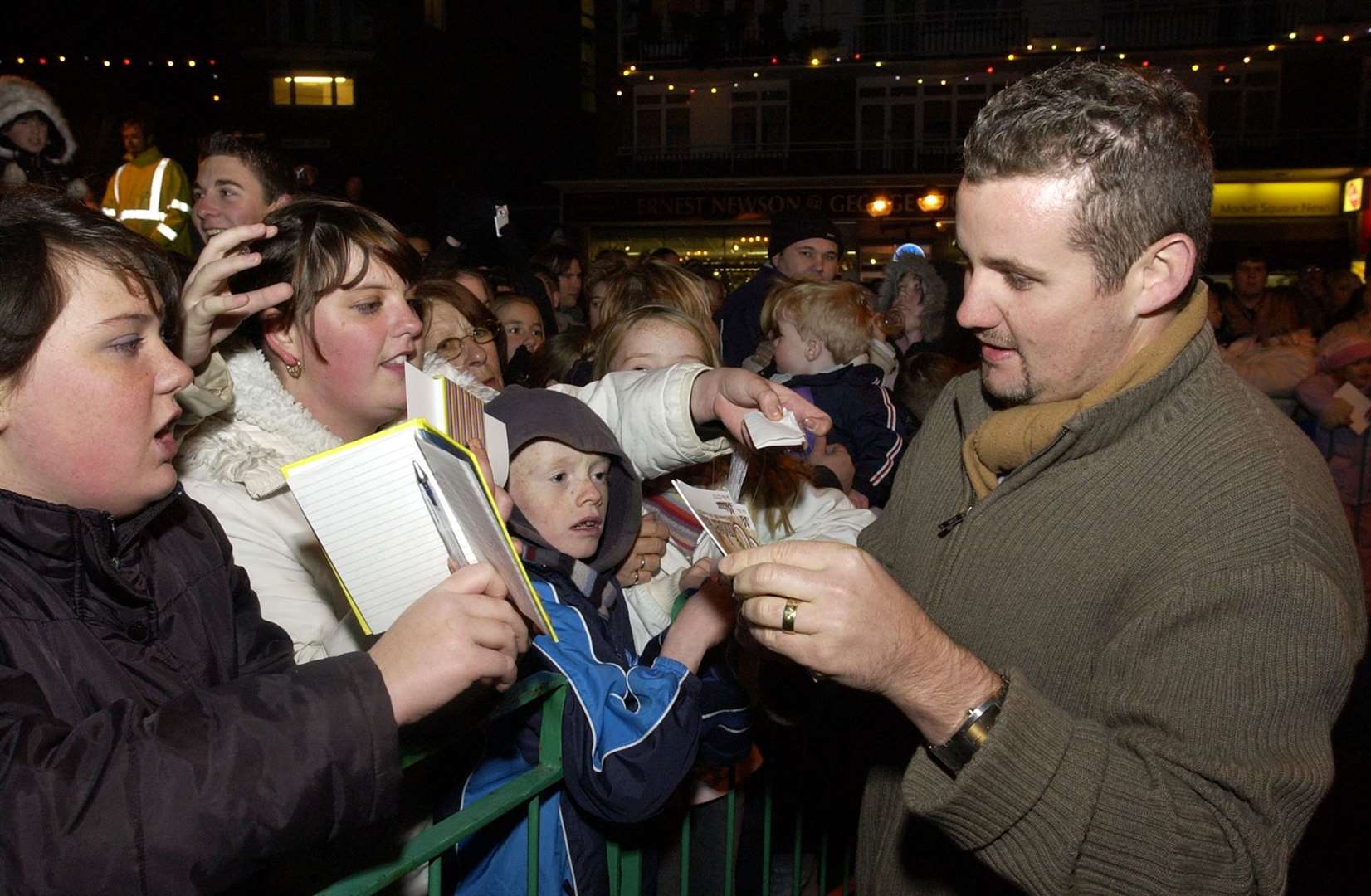 Neighbours actor Ryan Moloney signs autographs at the Dover Christmas lights switch-on in 2005. Picture: Terry Scott