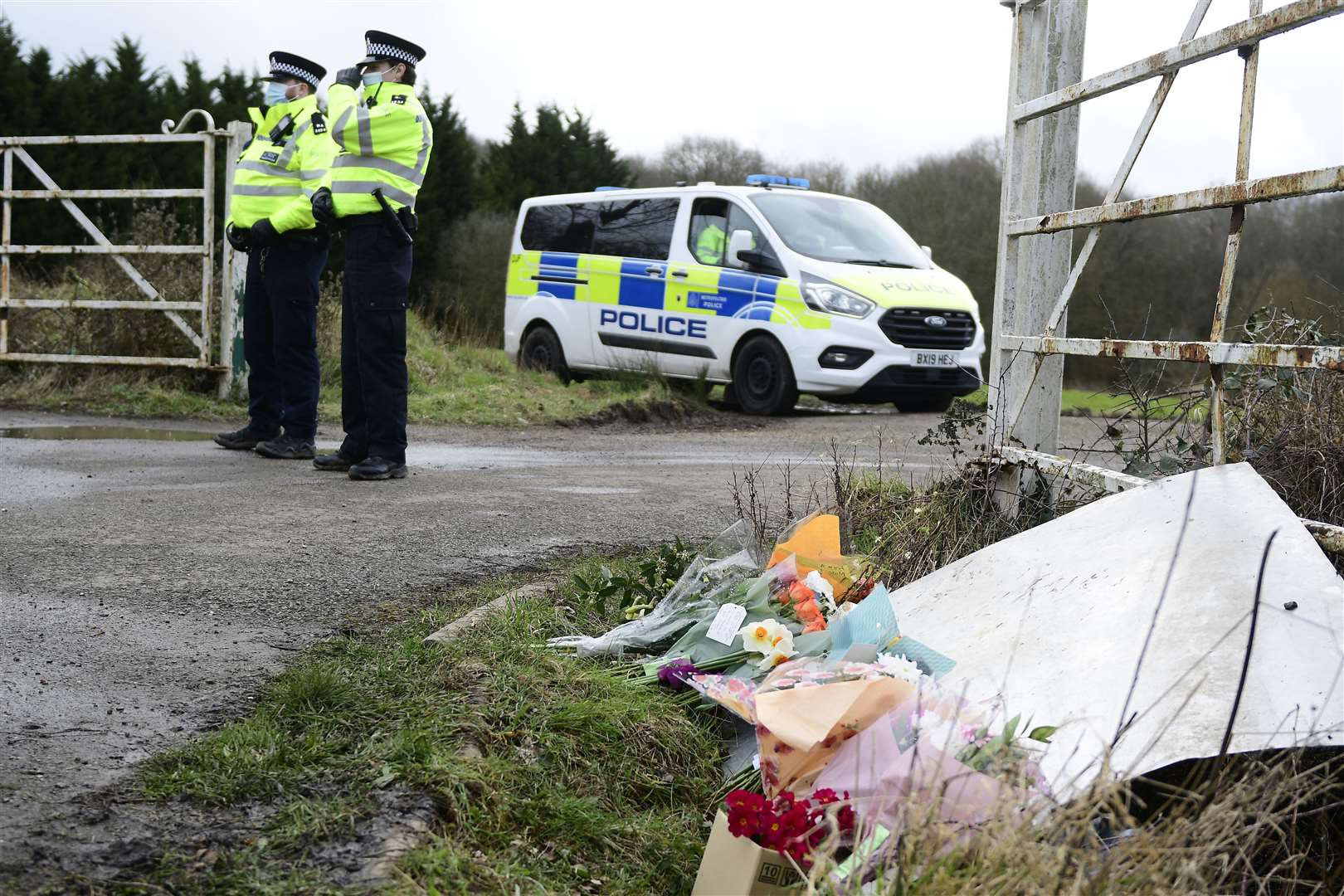 Flowers left by the public at the entrance to the search site in Great Chart Picture: Barry Goodwin