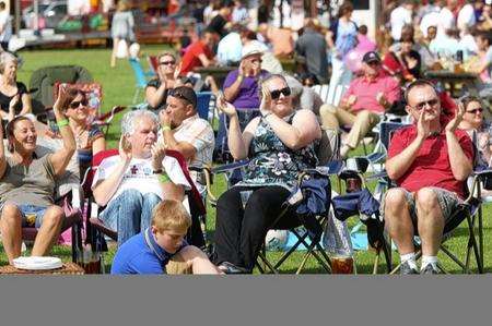 People enjoy the music at UKP Leisure Club Open Air Music Festival, in Sittingbourne