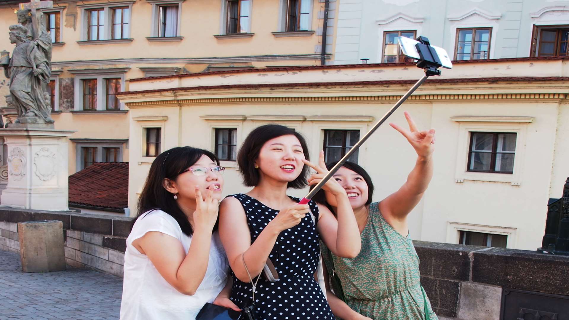 The metal sticks are used to take self portraits or "selfies"