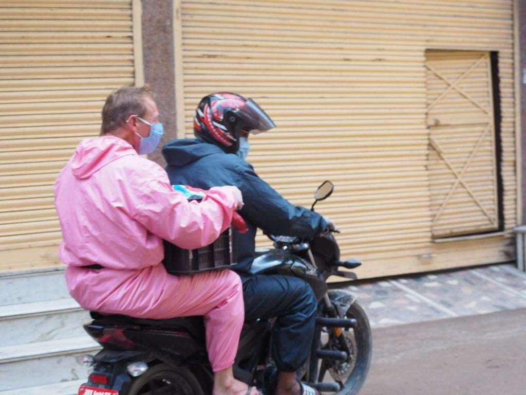 Some of the meals are delivered to people on motorbikes. Picture: Richard Bayfield