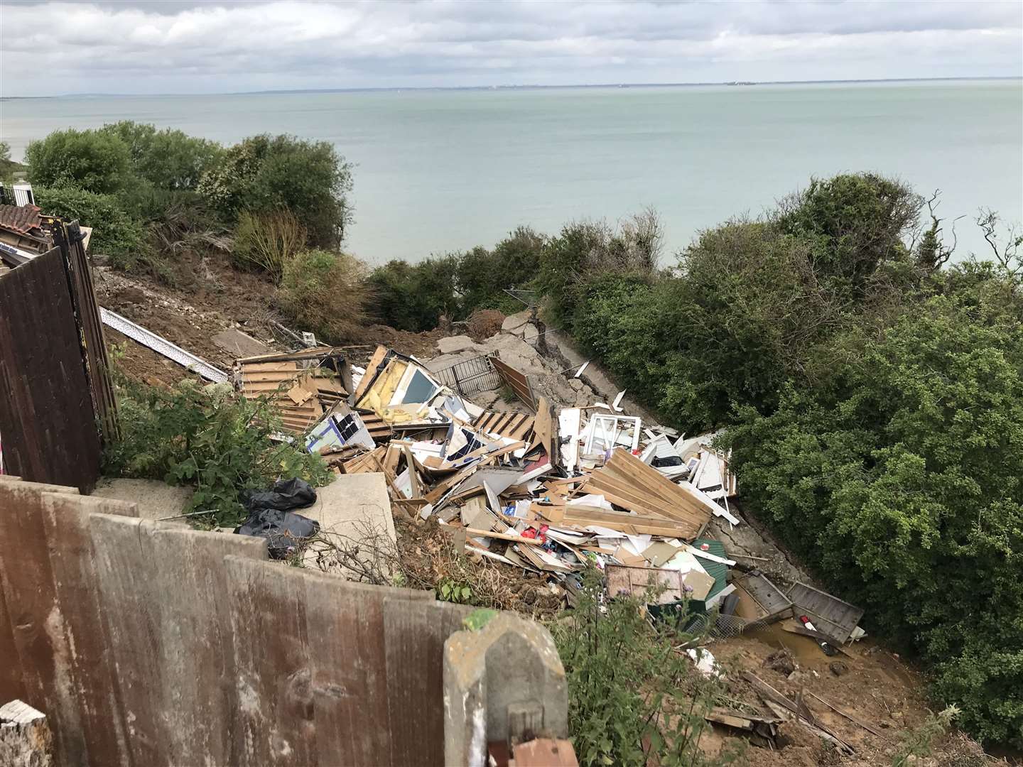 The remains of Emma's family home when it fell off the cliff at Surf Crescent, Eastchurch