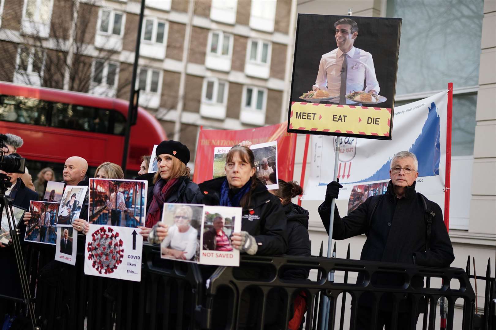 Protesters outside the UK Covid-19 Inquiry at Dorland House in London, where Prime Minister Rishi Sunak was giving evidence (Jordan Pettitt/PA)