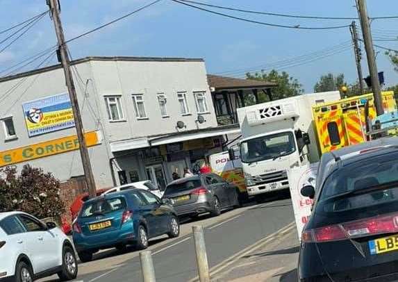 Police and ambulance crews outside the Premier shop in Leysdown Road last Wednesday