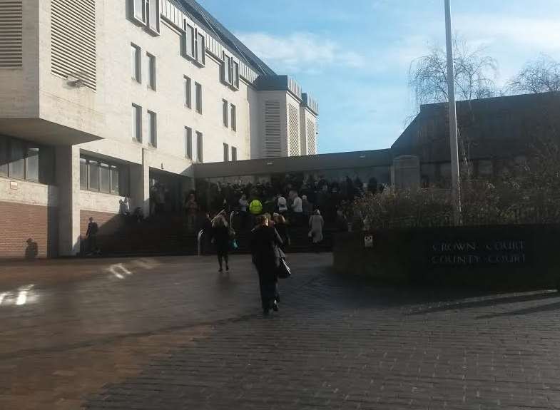 People returning to court after the evacuation