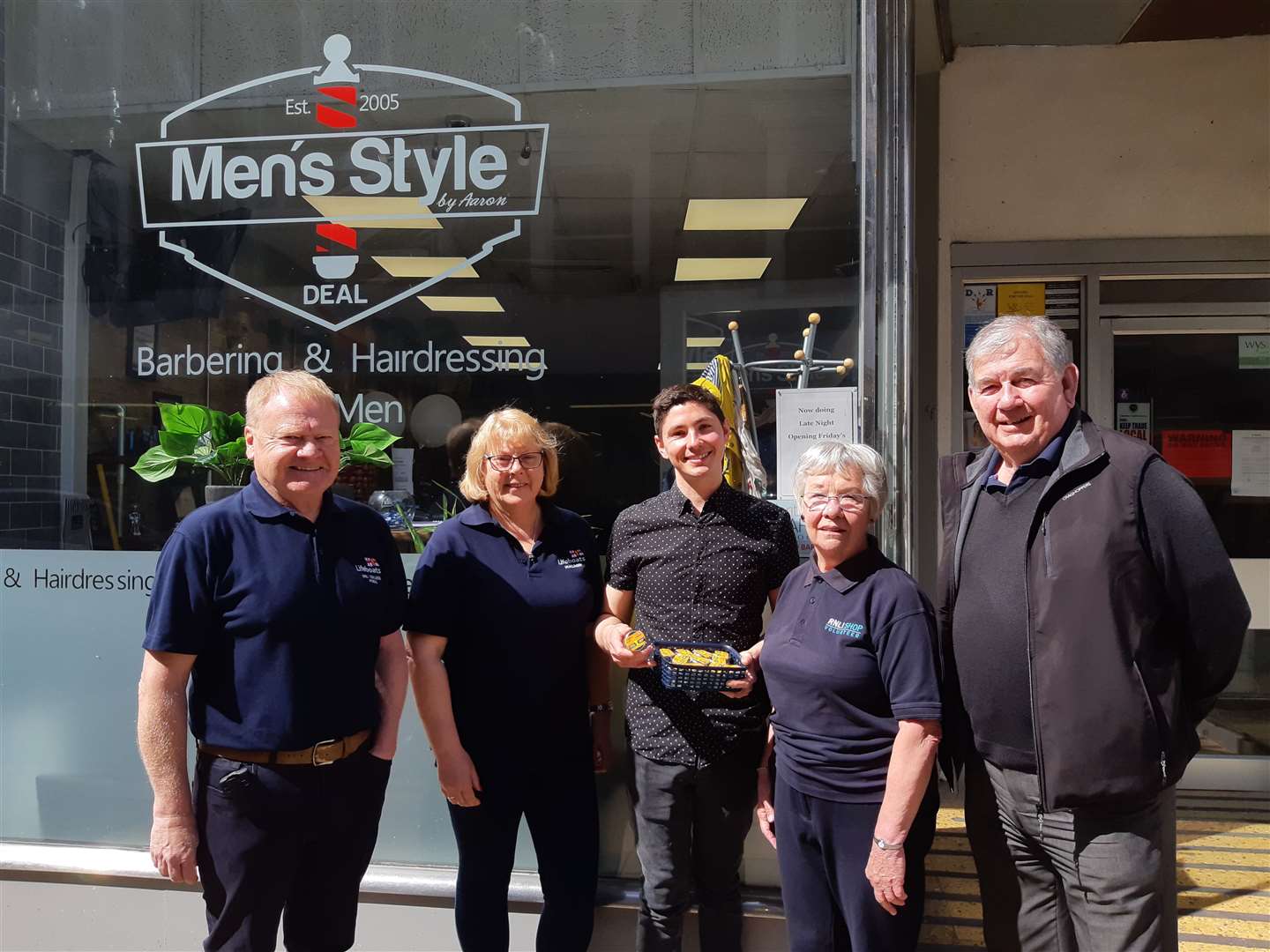 Aaron Dawkins of Men's Style (centre) with Chris Winslade, Dawn Whitbread, Ann Austin and Roger Blown from Walmer RNLI