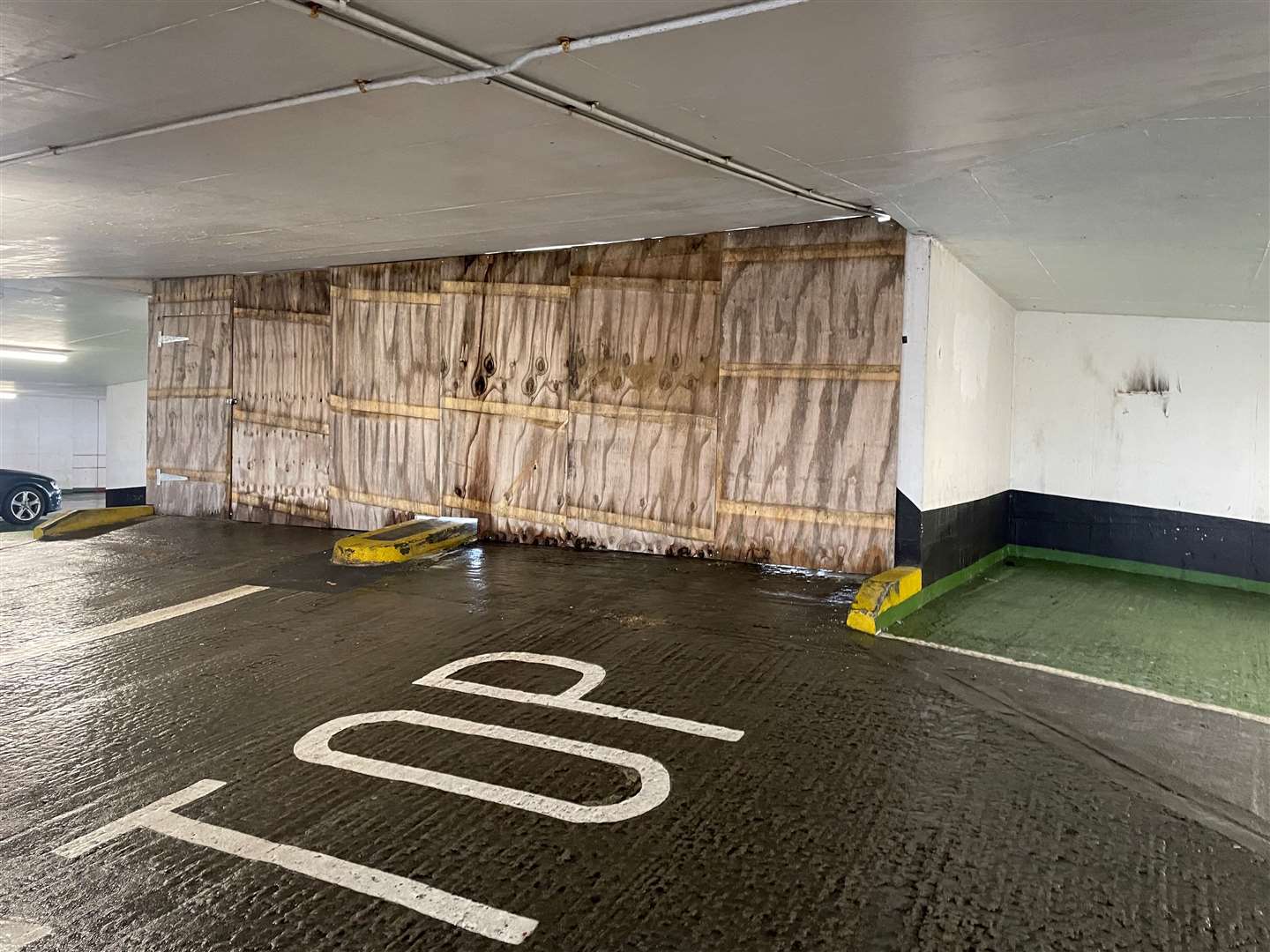 The ramp to the fourth floor of the car park has already been boarded up