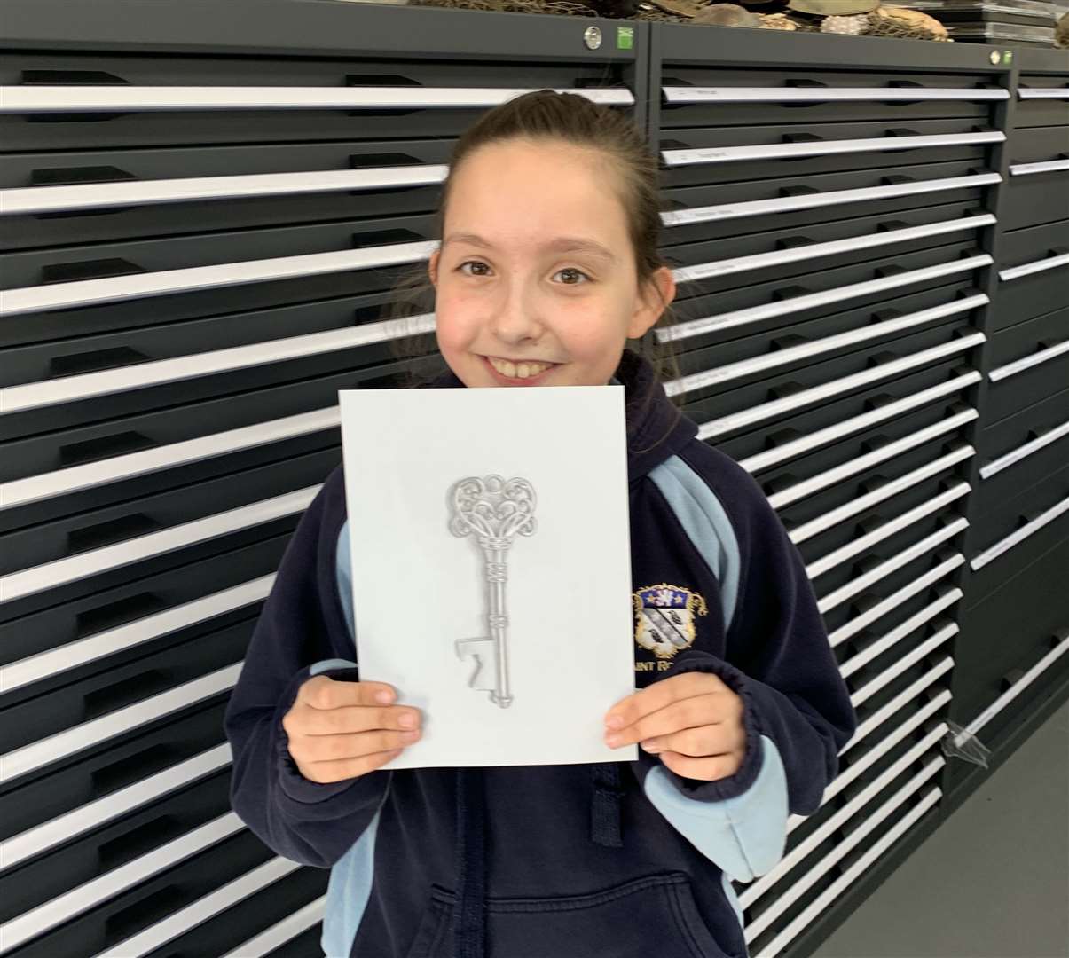 Izzy Reynolds, 10, with her drawing
