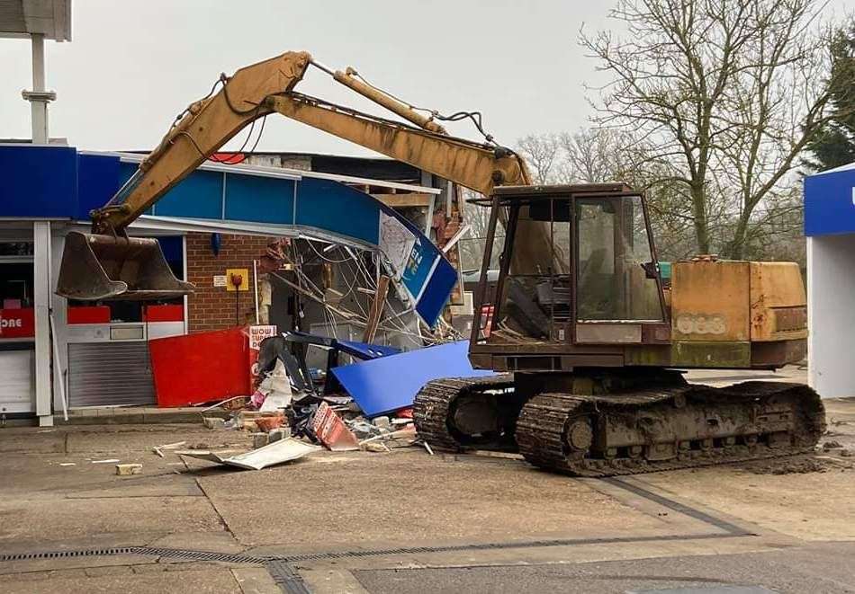 The damage caused at an Esso garage in Staplehurst, after a digger was used to rip the cash machine away