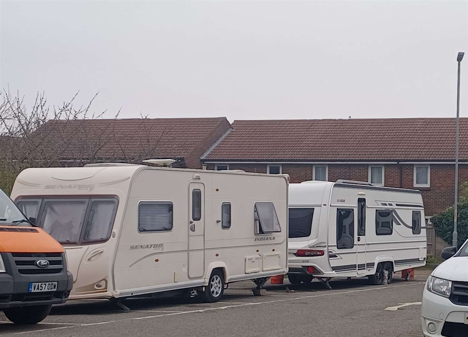 Some of the caravans that are in the car park off the A2 in Rainham