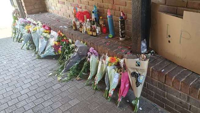 Tributes were left to an 18-year-old stabbing victim in an alleyway in Dartford High Street