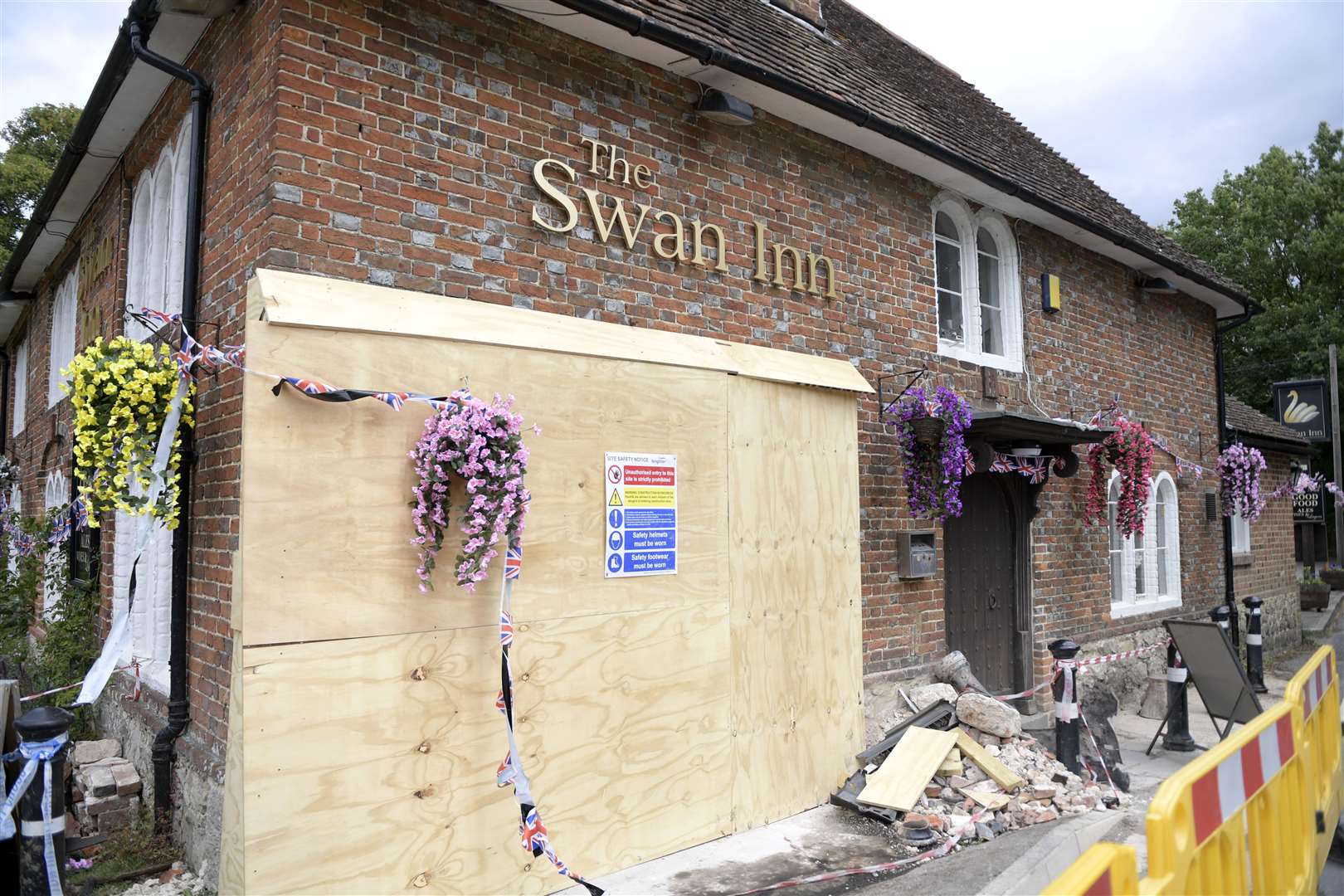 Front of the pub had to be boarded up after the smash Picture: Barry Goodwin