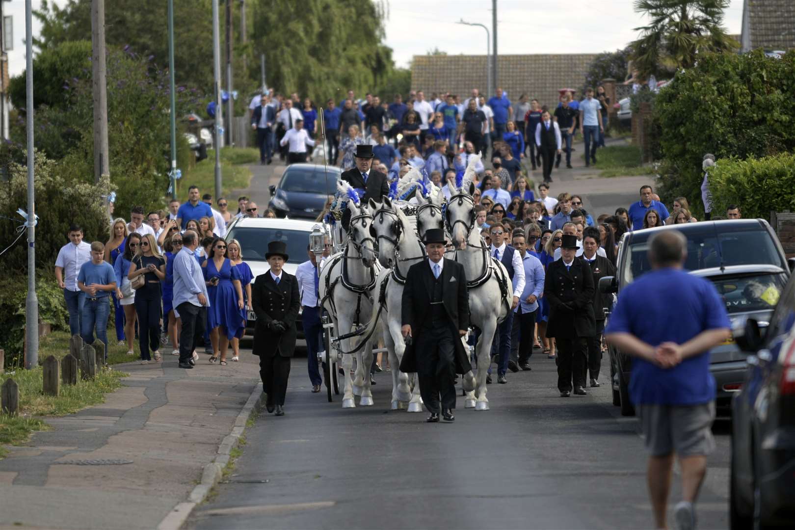 The funeral procession comes down towards London Road from Henry's home