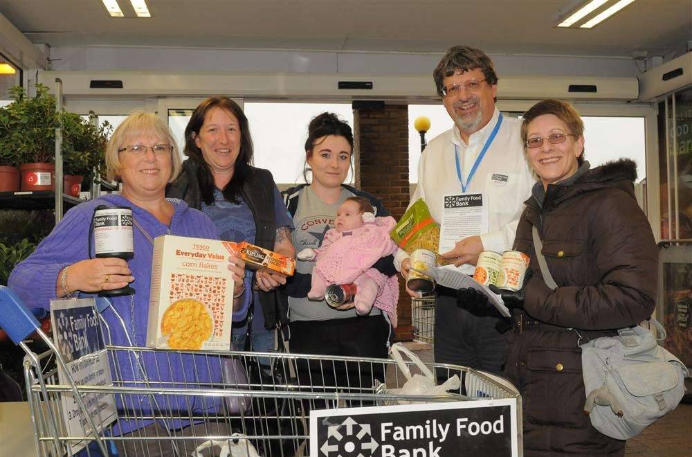 Ceri Norman, Danielle Achilles, Carrie and Lexi Ireland, Chris Norman and Angela Harrison at the food drive at Tesco, Sheerness