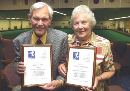 HARDWORKING COUPLE: Audrey Lancaster and her late husband Alan receiving awards from the KCFA in 2004