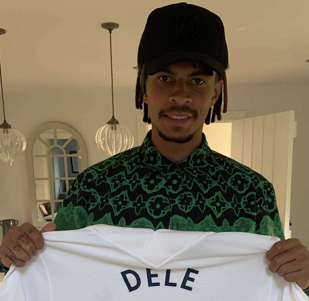 Dele Alli with a shirt gifted to Wing Kingz. Picture: Aaron Murrell