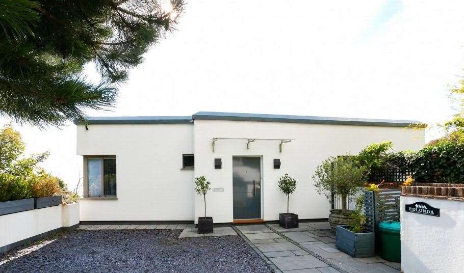 You would never guess what this four-bedroom house in Hythe looks like from its front door. Picture: Lawrence and Co