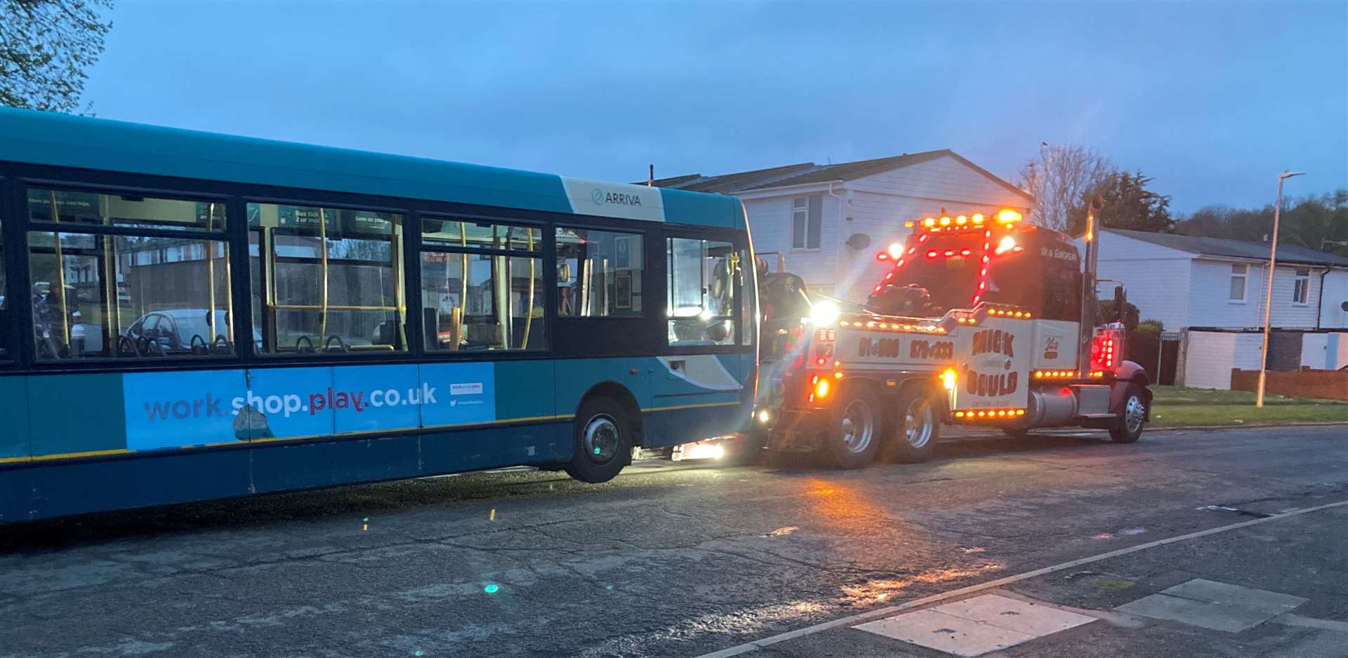 A truck towing the bus away following the incident. Picture: Jack Sullivan