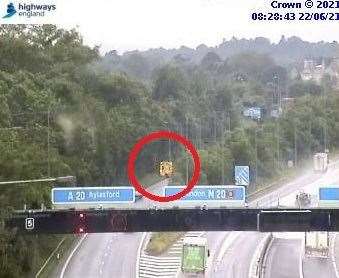 One lane is closed on a motorway slip road because of a stranded vehicle. Picture: Highways England