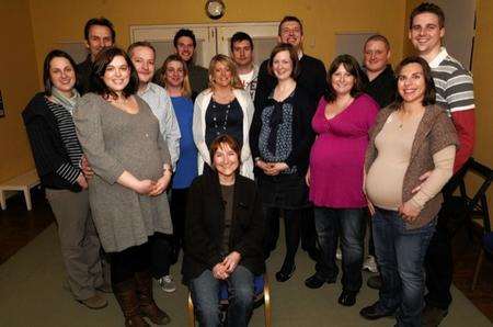 Rachel Stead with her latest antenatal class, at Subdub House, Faversham, as she celebrates teaching her 1,000th couple.