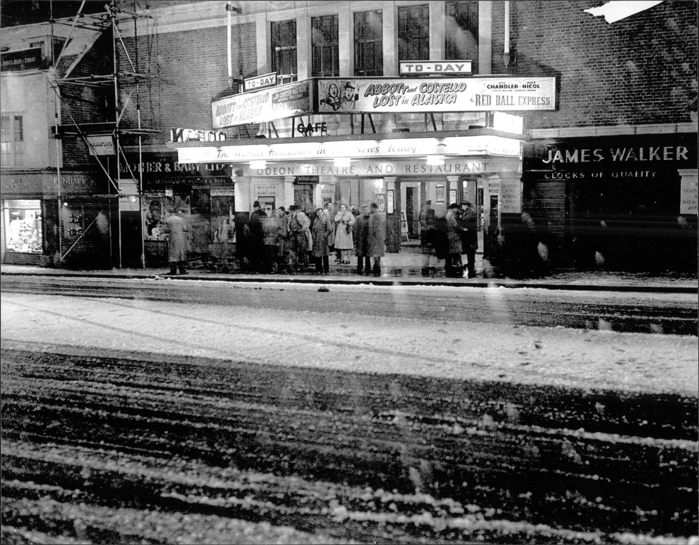Filmgoers sheltring from snow in one of Kent's many cinemas, 1952. This is the Odeon in Ashford's Lower High Street. Picture from Steve Salter