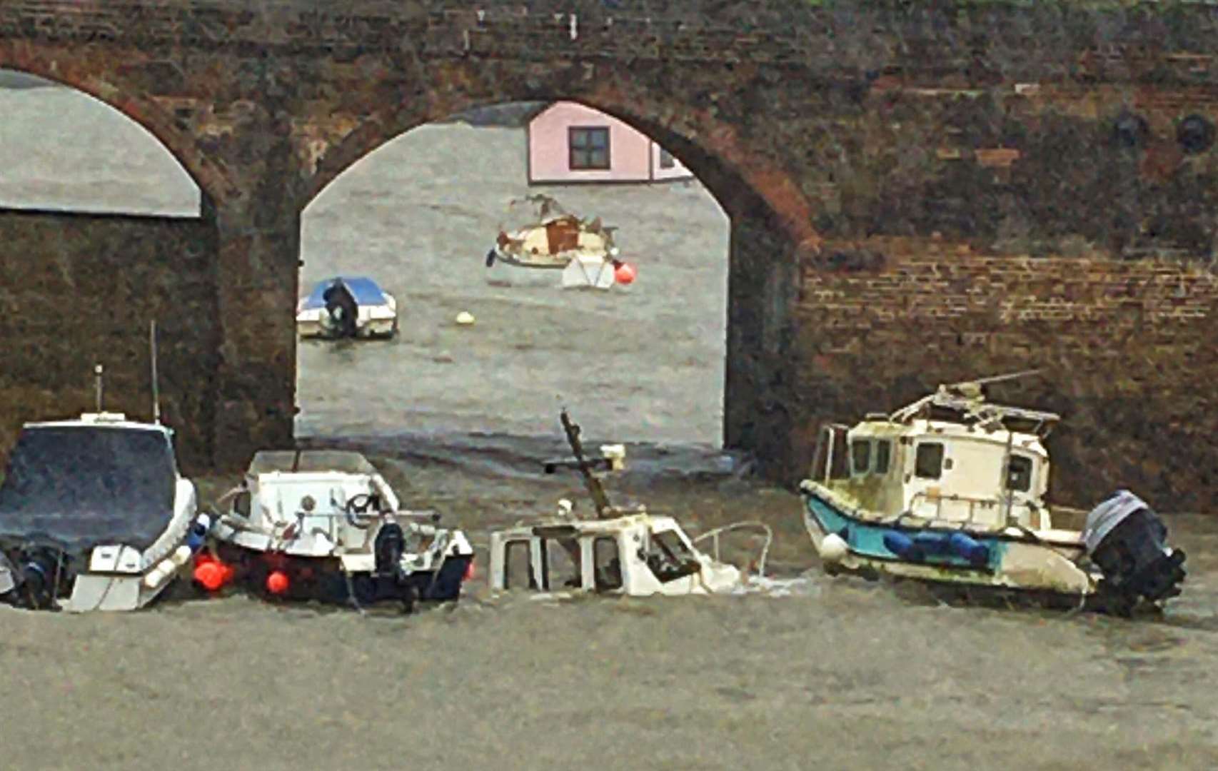Fishing boats at the Folkestone harbour were destroyed by the waves. Picture: David Illsley