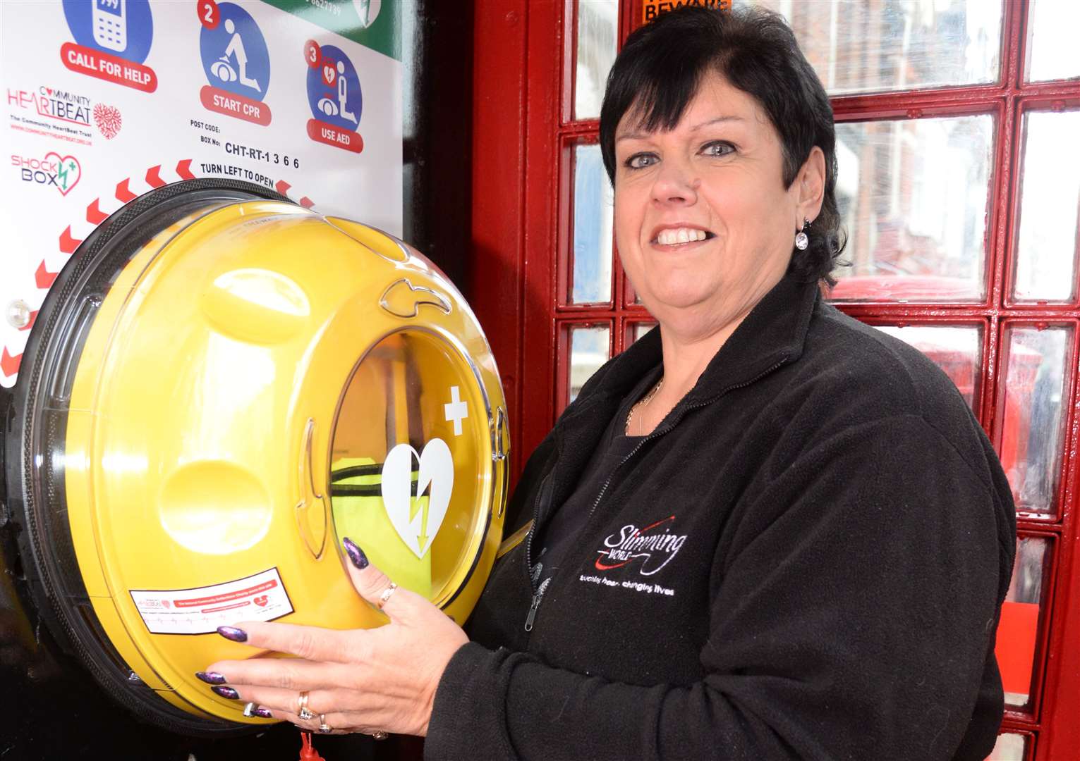 Sally De Vere with the defibrillator