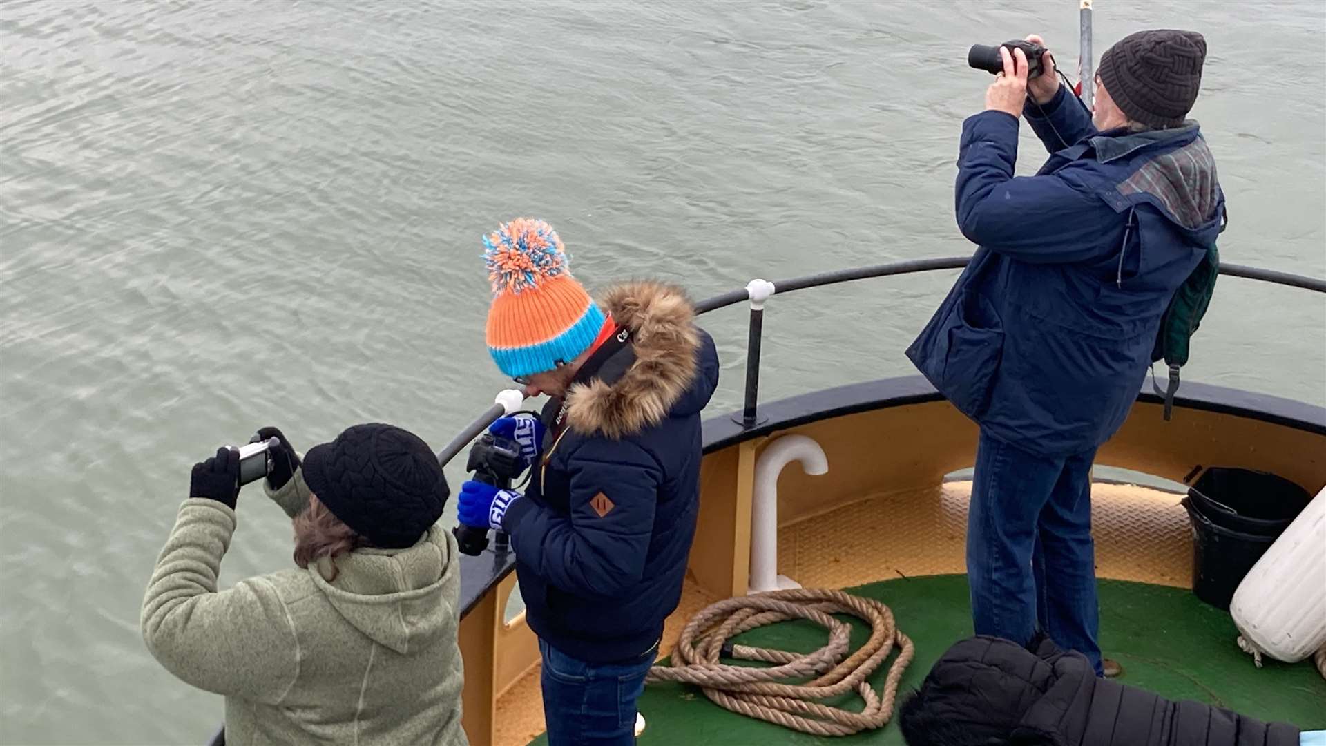 Photographers aboard the X-Pilot which is running trips to see the masts of the Sheppey bomb ship SS Richard Montgomery