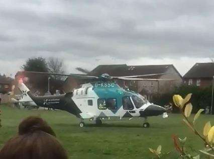 The air ambulance landed on the green between Foxgrove and Clement Close, Kemsley. Picture: Sammi Wellings
