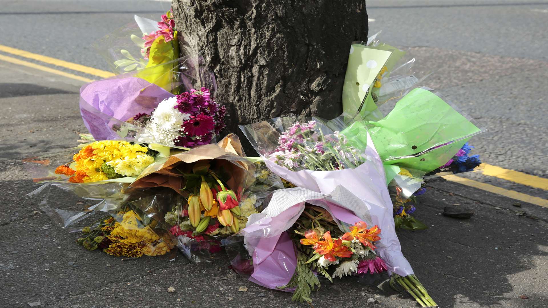 Floral tributes have been left at the scene of the crash. Picture: Martin Apps