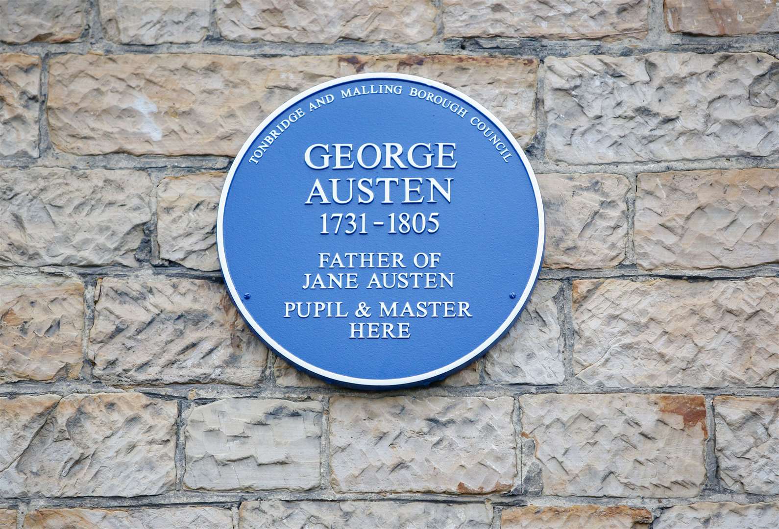 A blue plaque to George Austen, father of Jane Austen, is displayed on the Cawthorne Lecture Theatre at Tonbridge School. Picture: Matthew Walker
