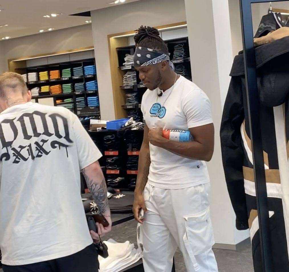 The boxer was filming content in the Hugo Boss store at Asford Designer Outlet