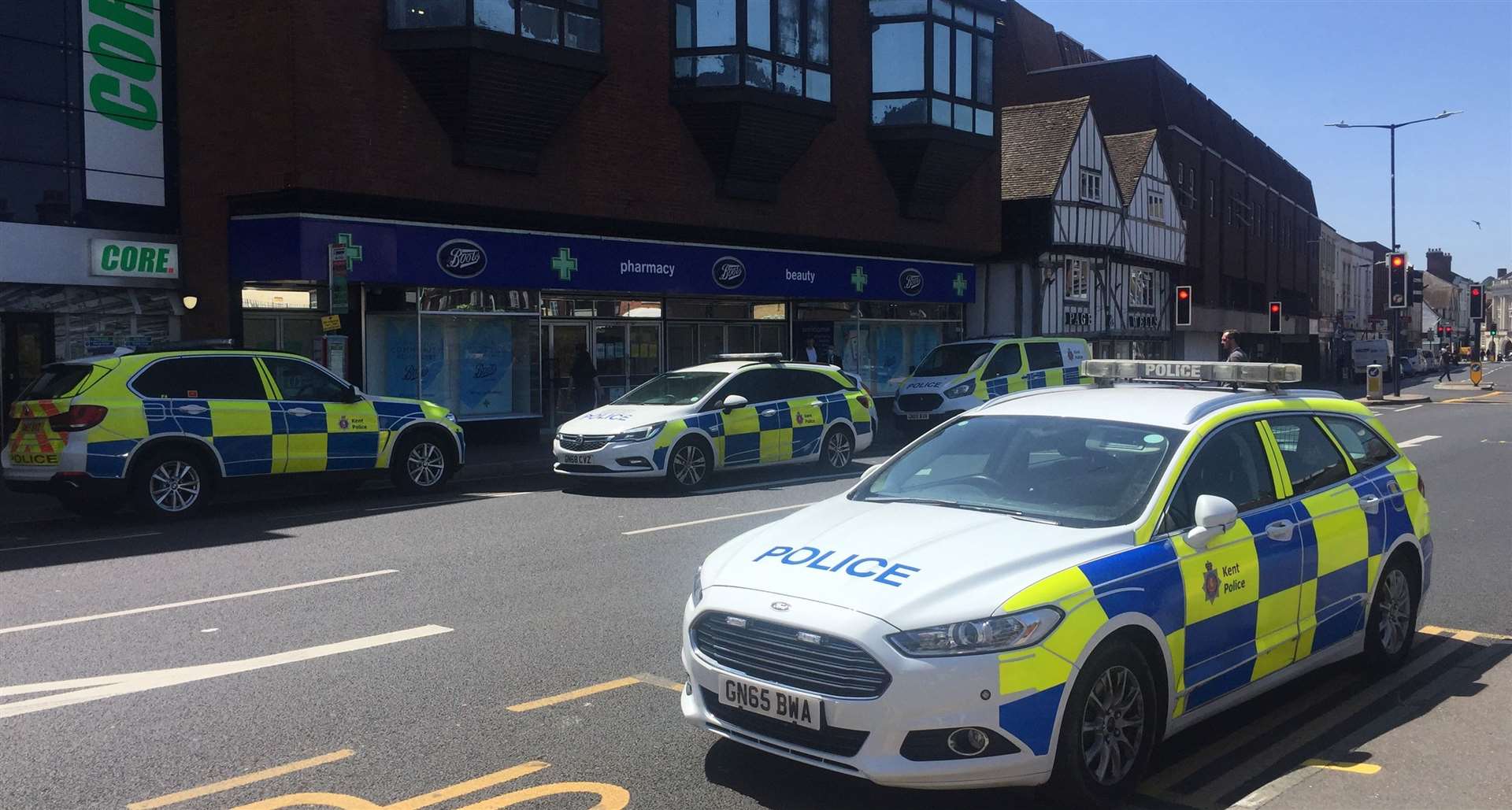 Five police cars were outside Boots on King Street, Maidstone