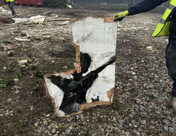 Builders pulling the Banksy remains out of the rubble in Herne Bay. Picture: Adam Brooks