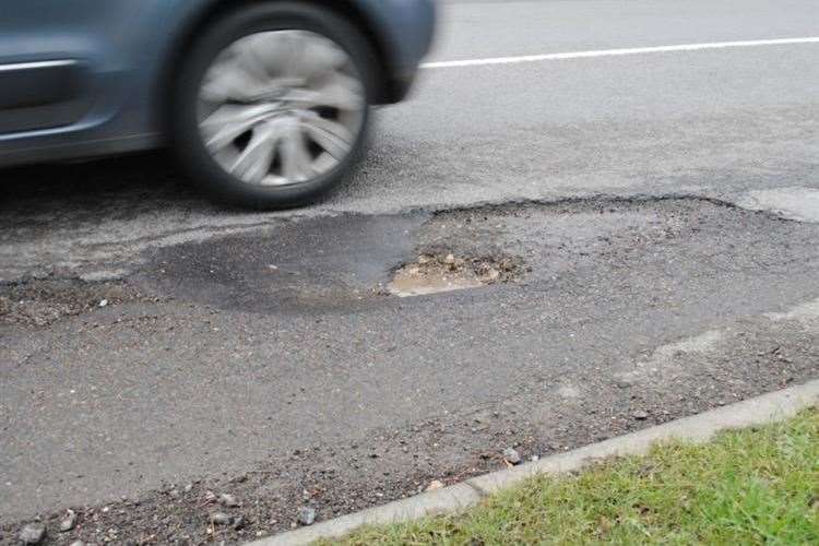 A pothole. Stock picture